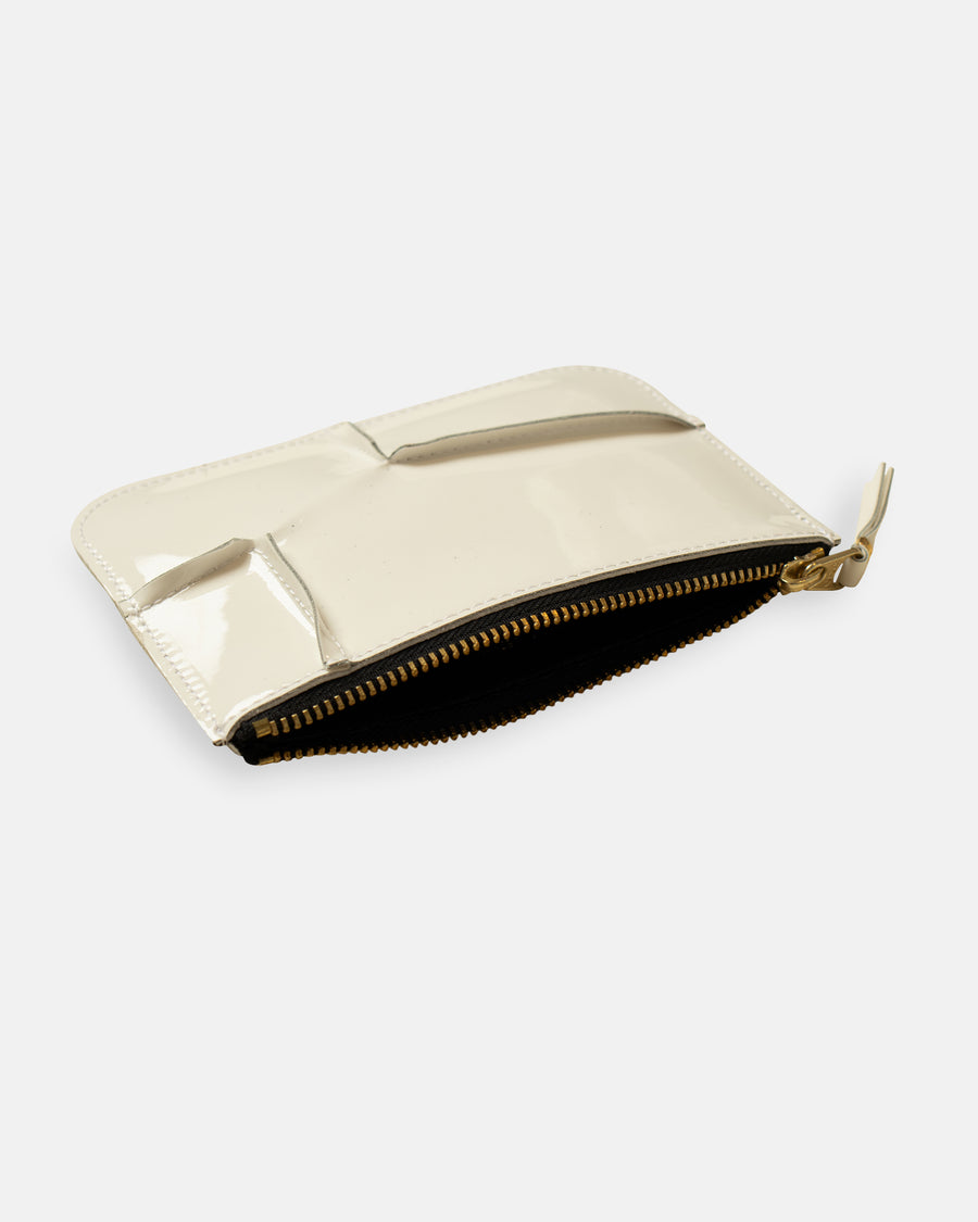 small reversed hem patent leather zip top pouch