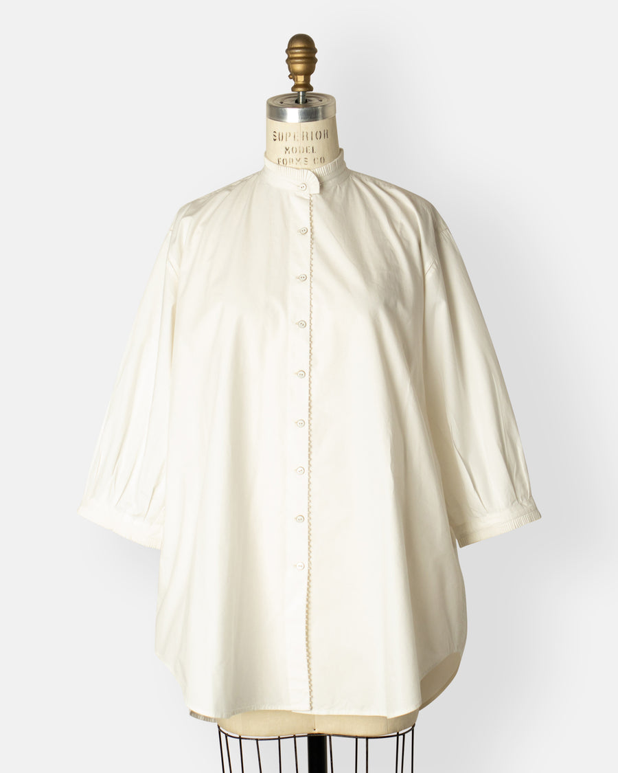 shirt with pleated neck trim